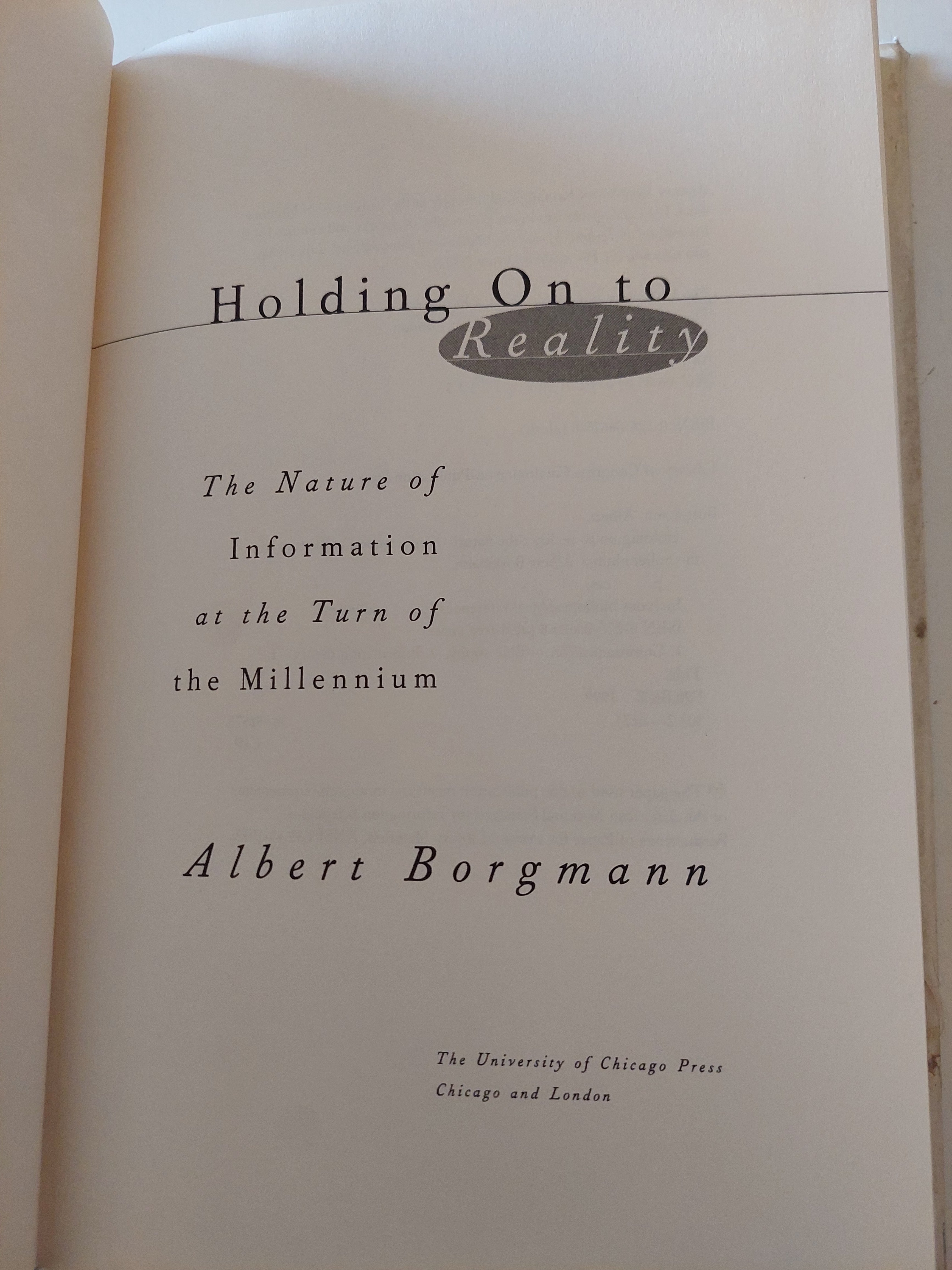 Holding on to Reality / Albert Borgmann - هارد كفر - متجر كتب مصرمتجر كتب مصر
