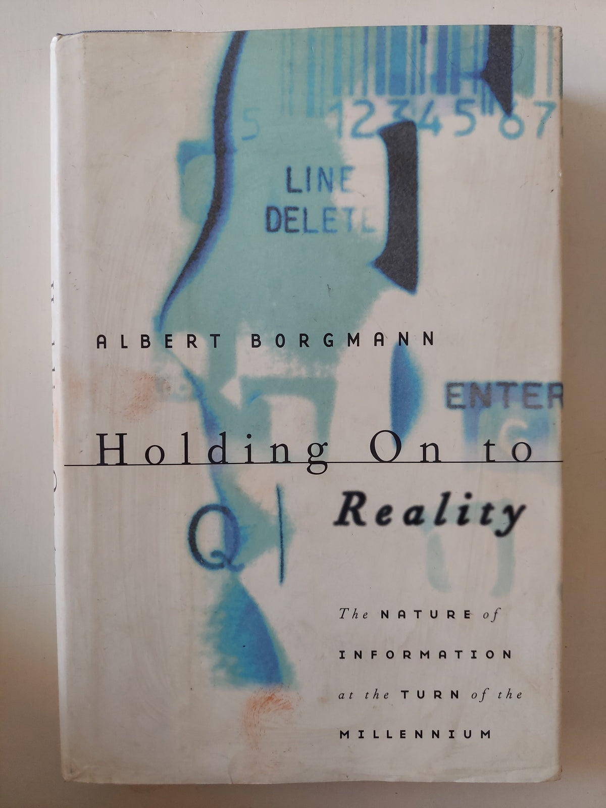 Holding on to Reality / Albert Borgmann - هارد كفر - متجر كتب مصرمتجر كتب مصر